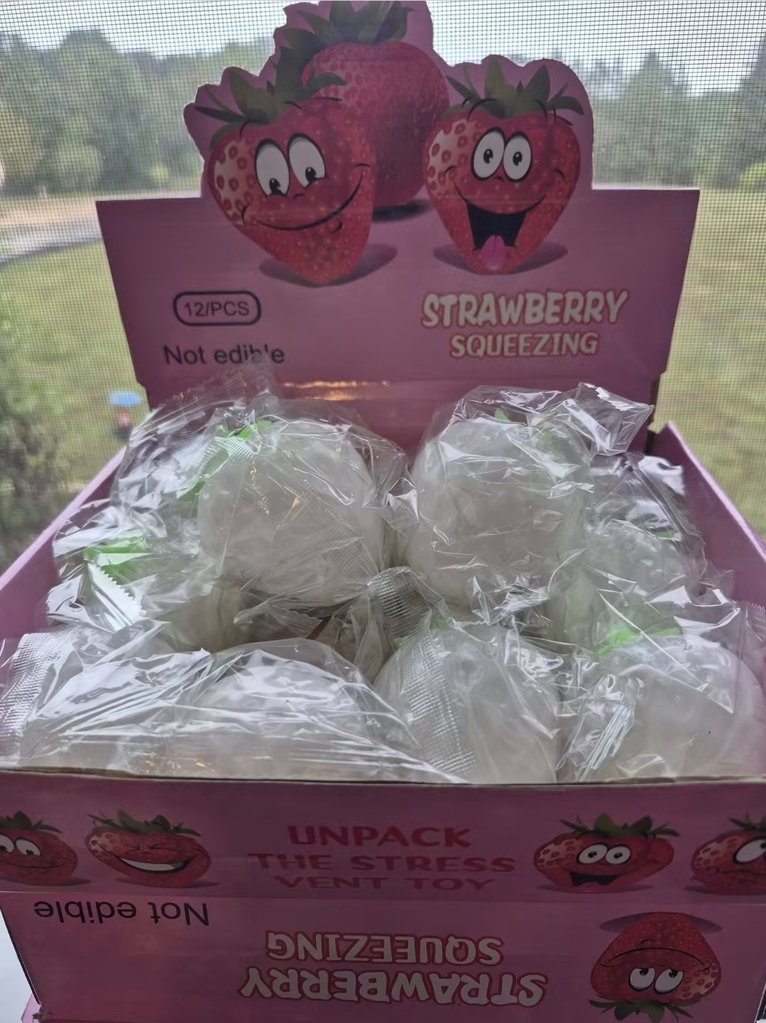 Strawberry Squeezing Squishy