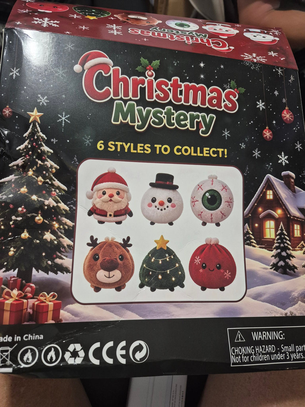 Christmas Mystery blind box display box showing 6 collectible styles