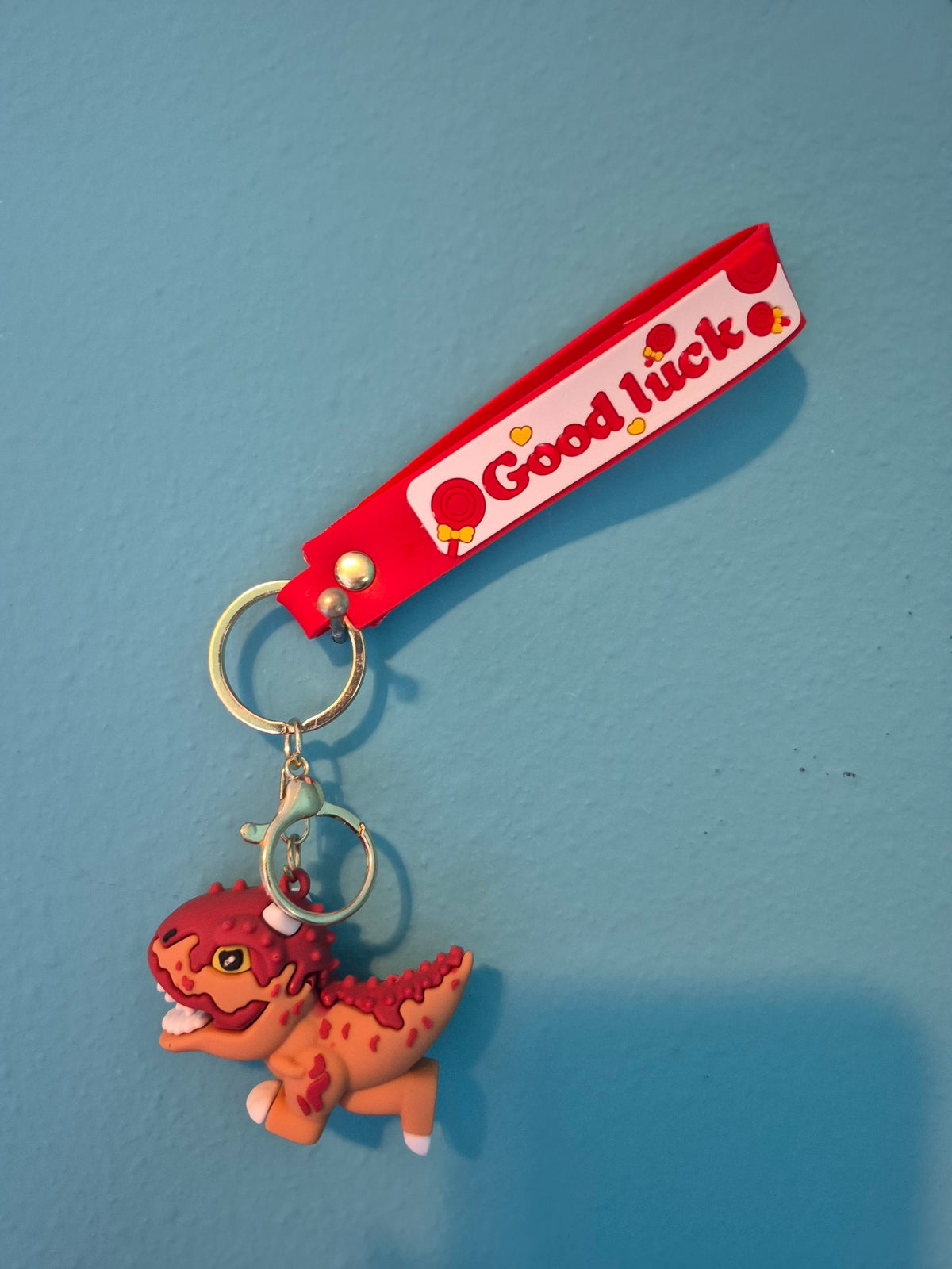 Red Carnotaurus Dinosaur Keychain – Dino Character Keychain with Wrist Strap