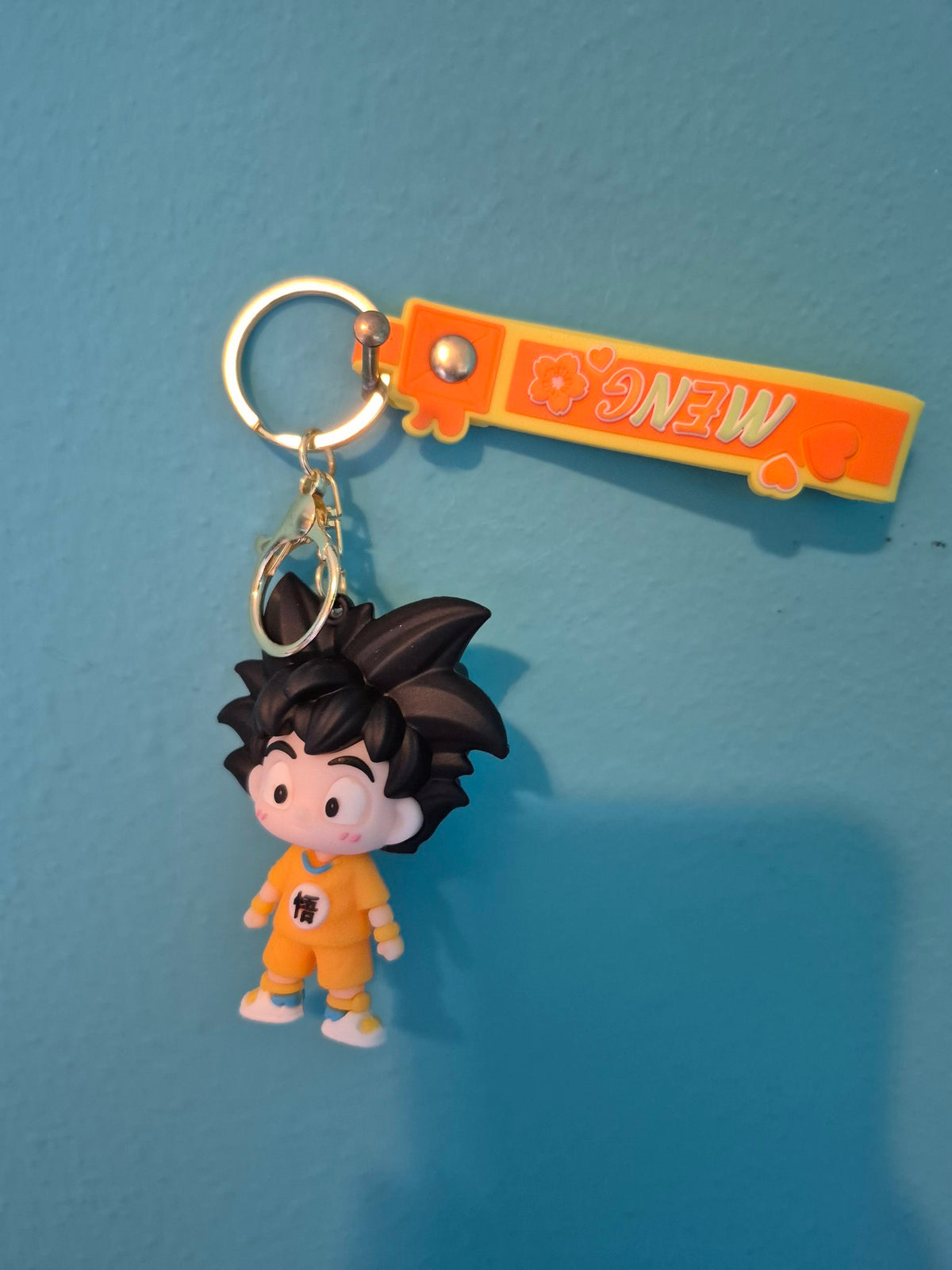 Chibi Goku Yellow Outfit Keychain – Dragon Ball Character Keychain with Wrist Strap