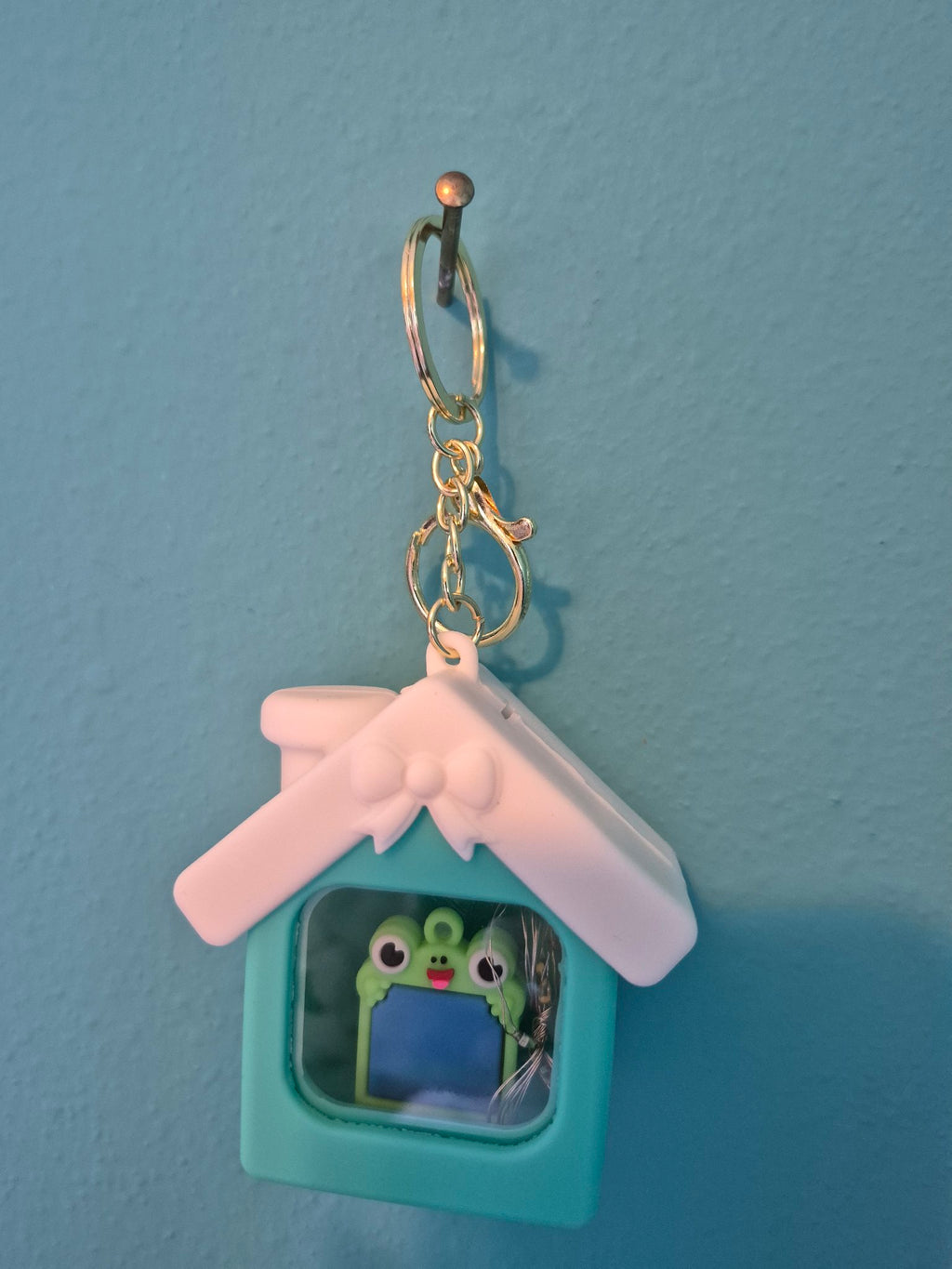 Light-Up House Keychain – Frog Teal House Character Keychain with LED Lights - photo 1