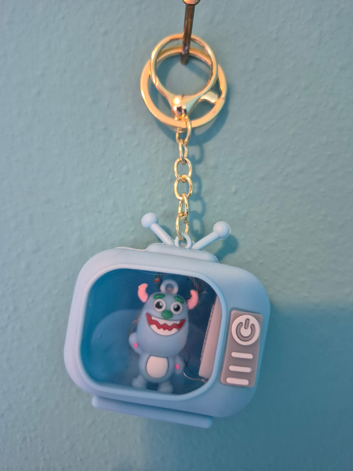 Light-Up TV Keychain – Blue Monster Light Blue TV Character Keychain with LED Lights - photo 1