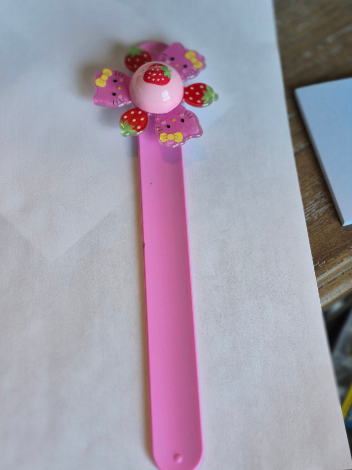 Hello Kitty Light-Up Spinner Slap Bracelet Pink Strawberry