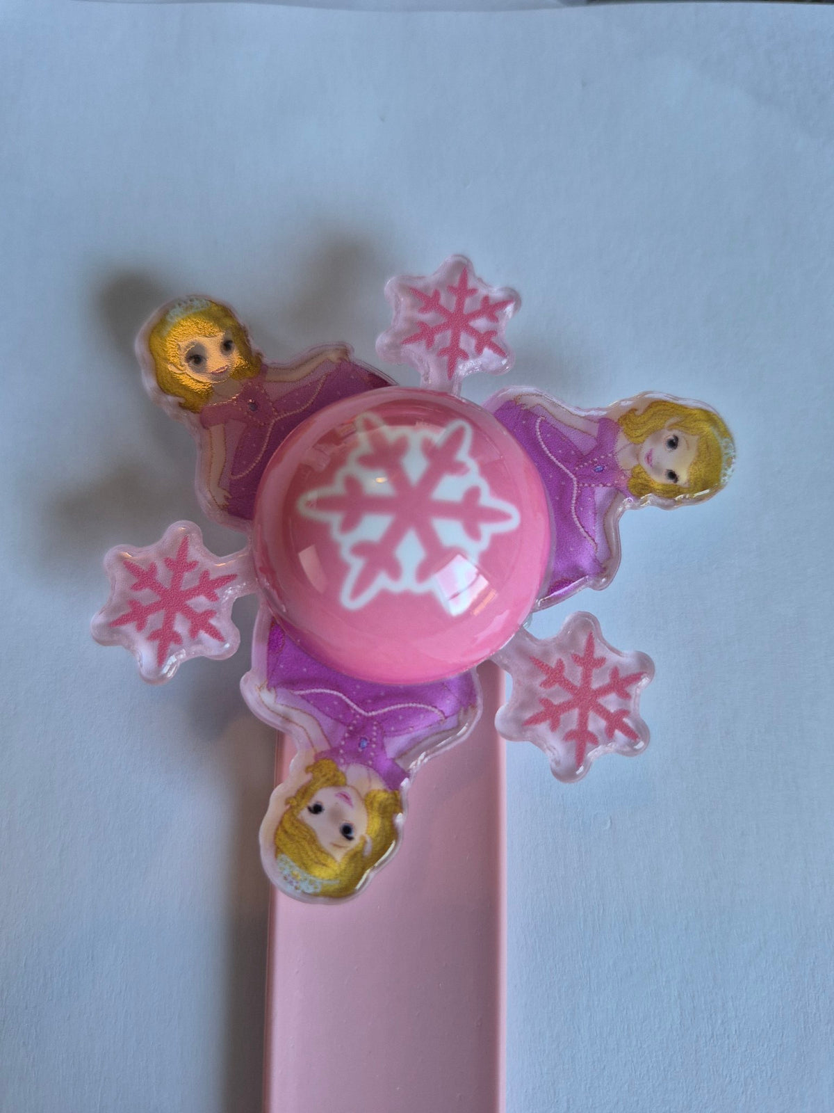 Princess Light-Up Spinner Slap Bracelet - Pink Snowflake spinner close-up