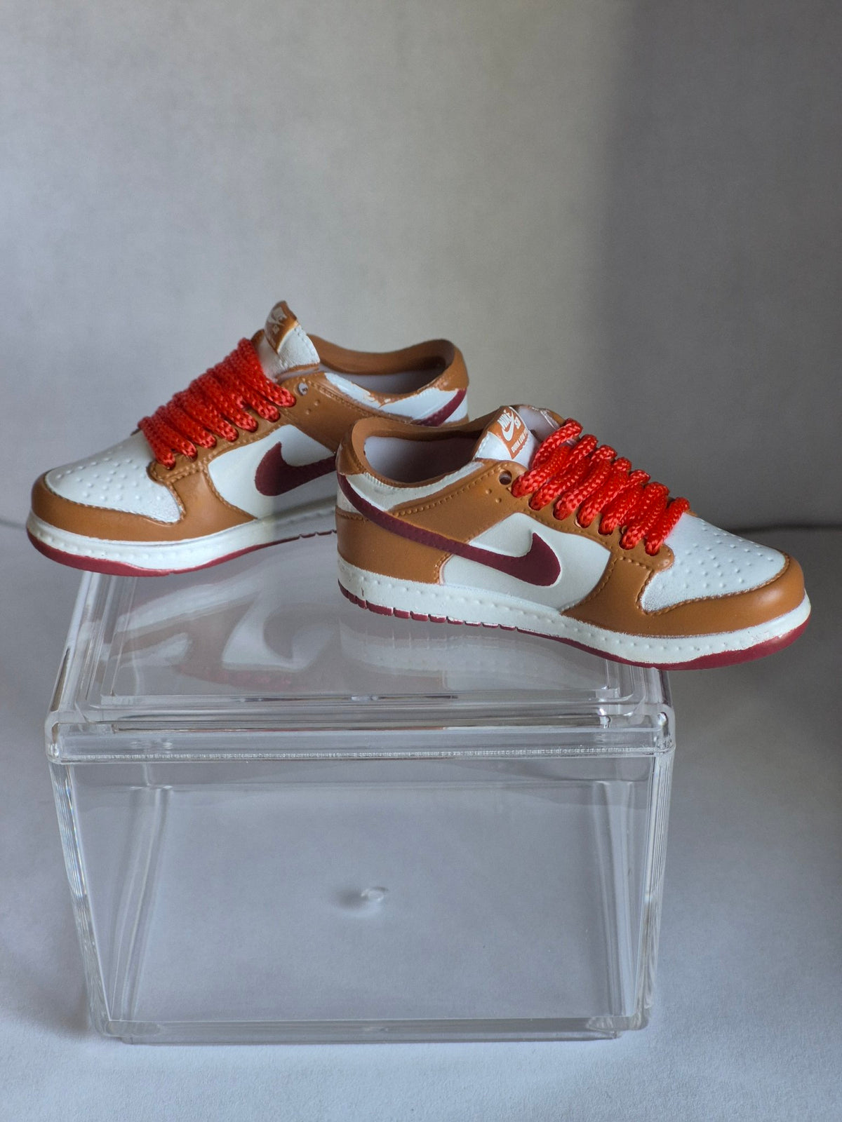 Tan and White Mini Sneakers with Orange Laces – Collectible Pair with Display Case