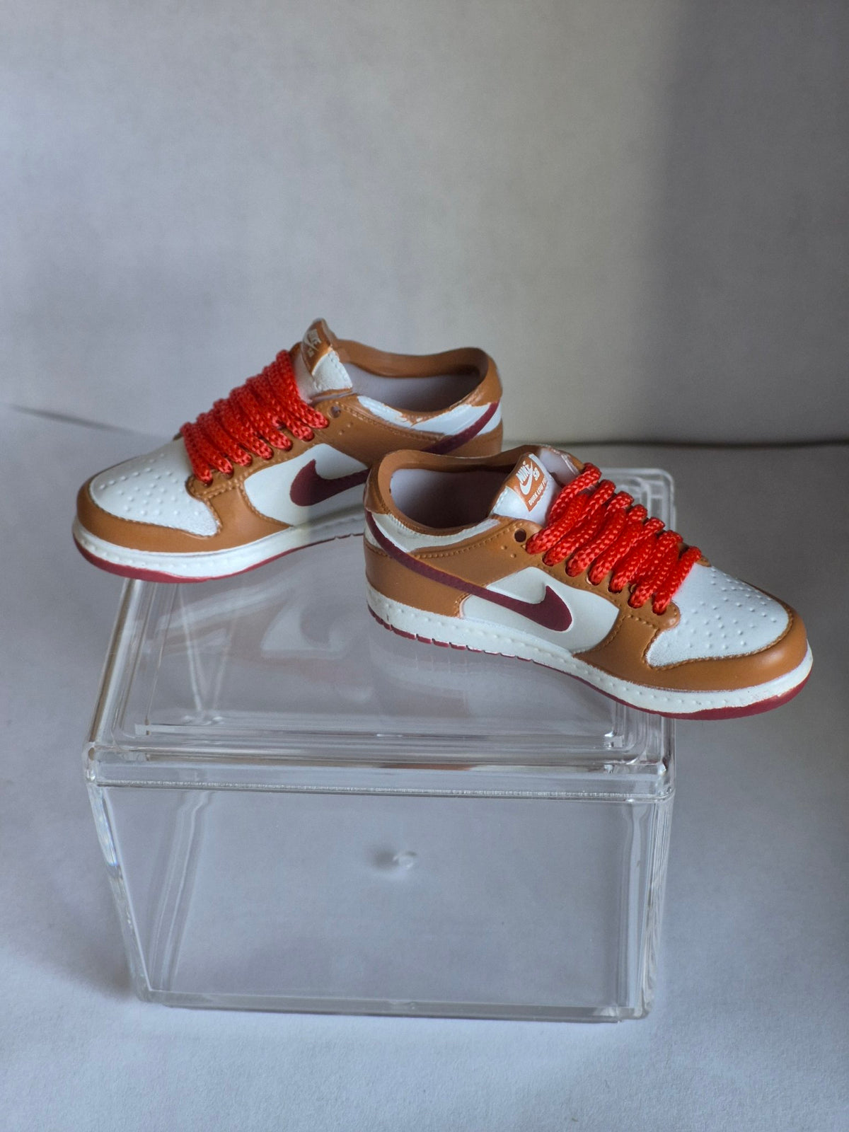 Tan and White Mini Sneakers with Orange Laces – Collectible Pair with Display Case