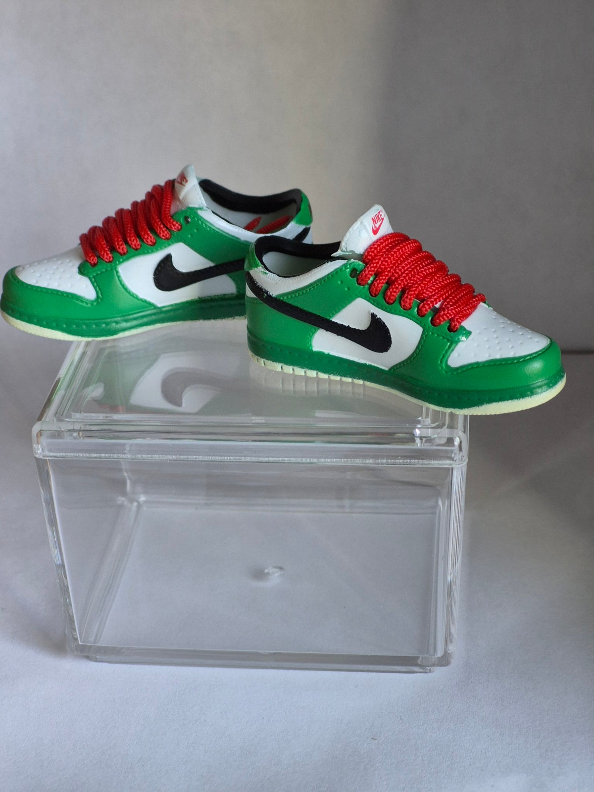 Green and White Mini Sneakers with Red Laces – Collectible Pair with Display Case