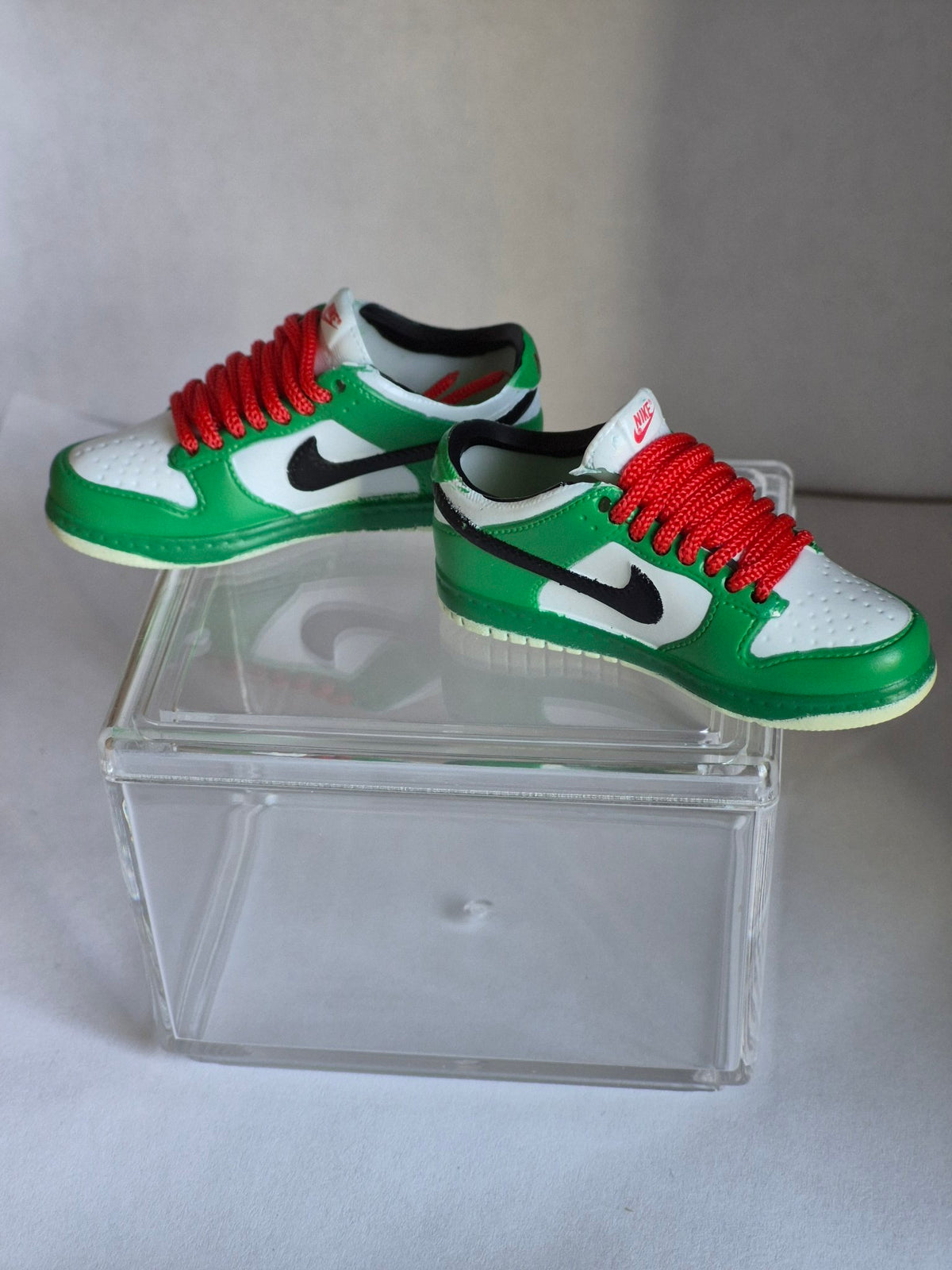 Green and White Mini Sneakers with Red Laces – Collectible Pair with Display Case