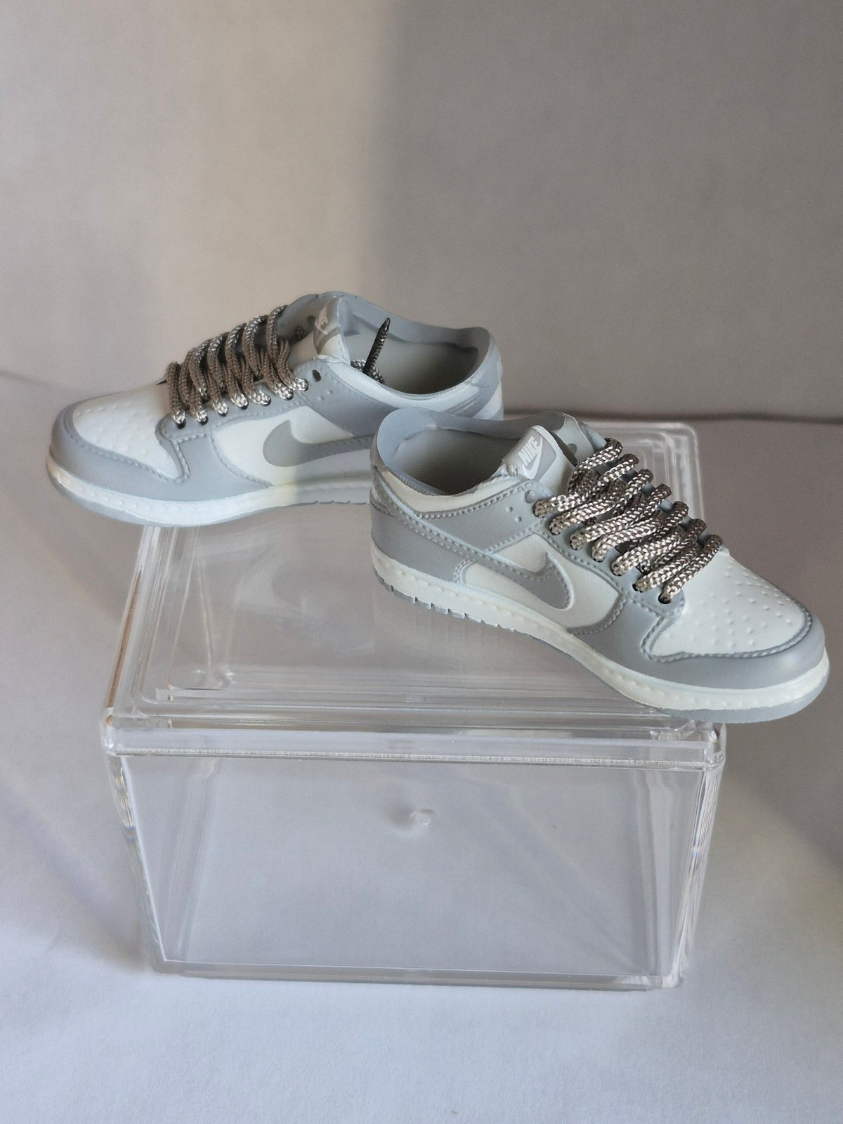 Gray and White Mini Sneakers – Collectible Pair with Display Case