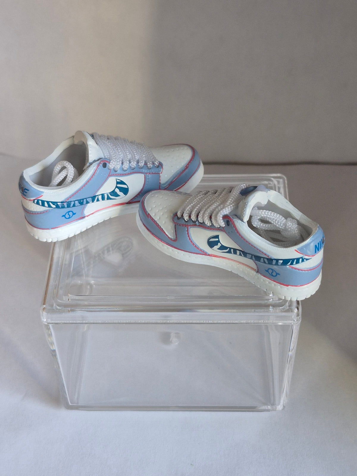 Light Blue and White Mini Sneakers - Collectible Pair with Display Case