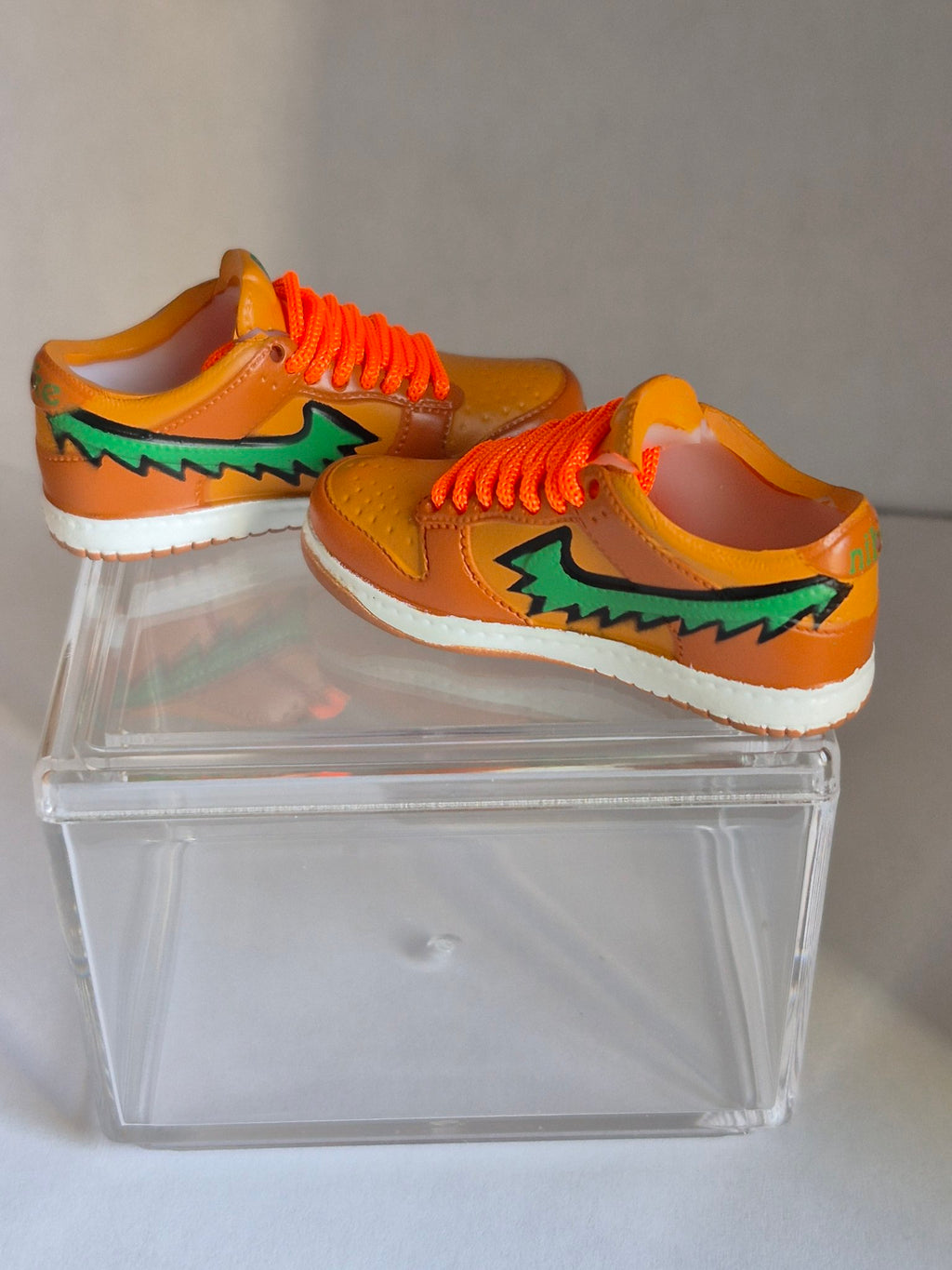 Orange and Brown Mini Sneakers with Green Swoosh – Collectible Pair with Display Case
