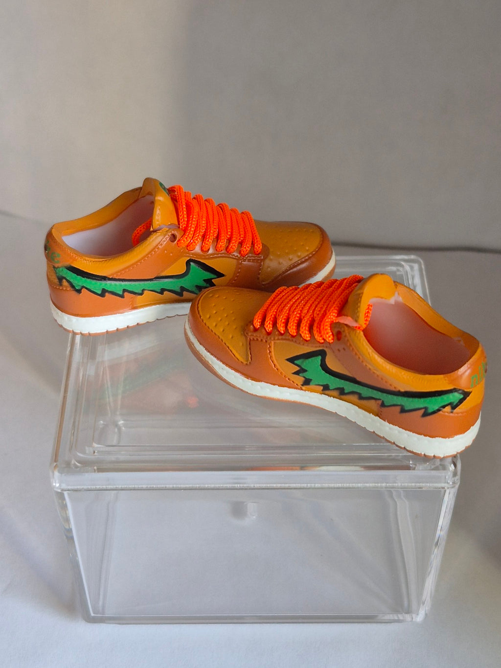 Orange and Brown Mini Sneakers with Green Swoosh – Collectible Pair with Display Case