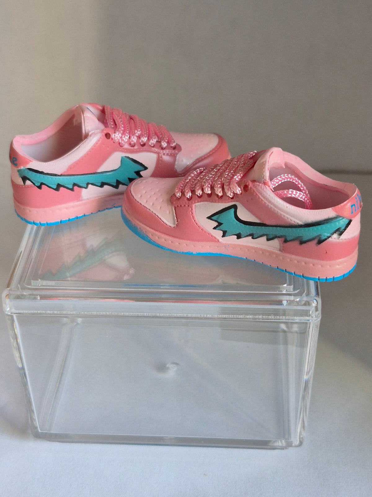 Pink Mini Sneakers with Teal Swoosh – Collectible Pair with Display Case