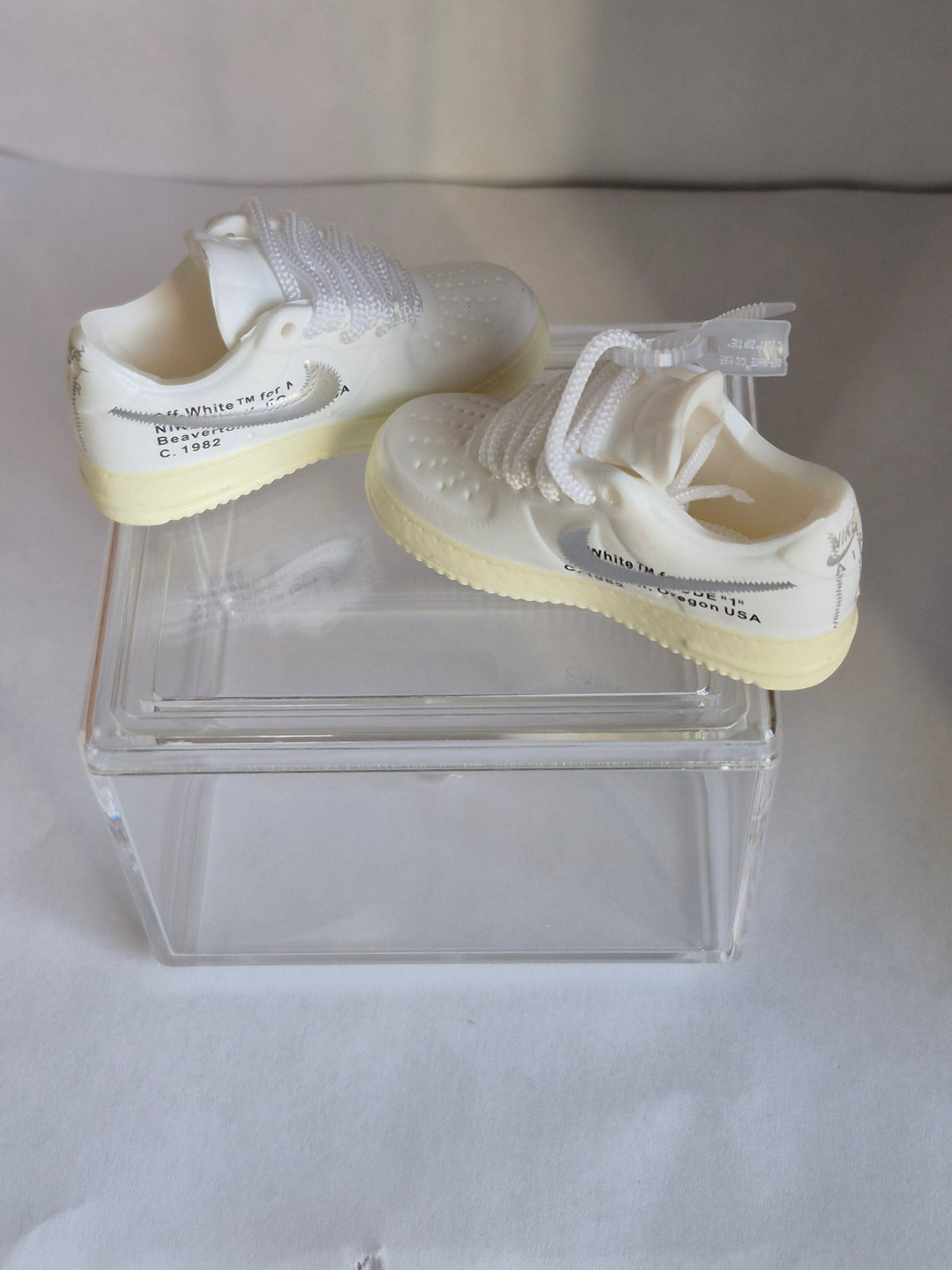 White Mini Sneakers with Gray Swoosh – Collectible Pair with Display Case