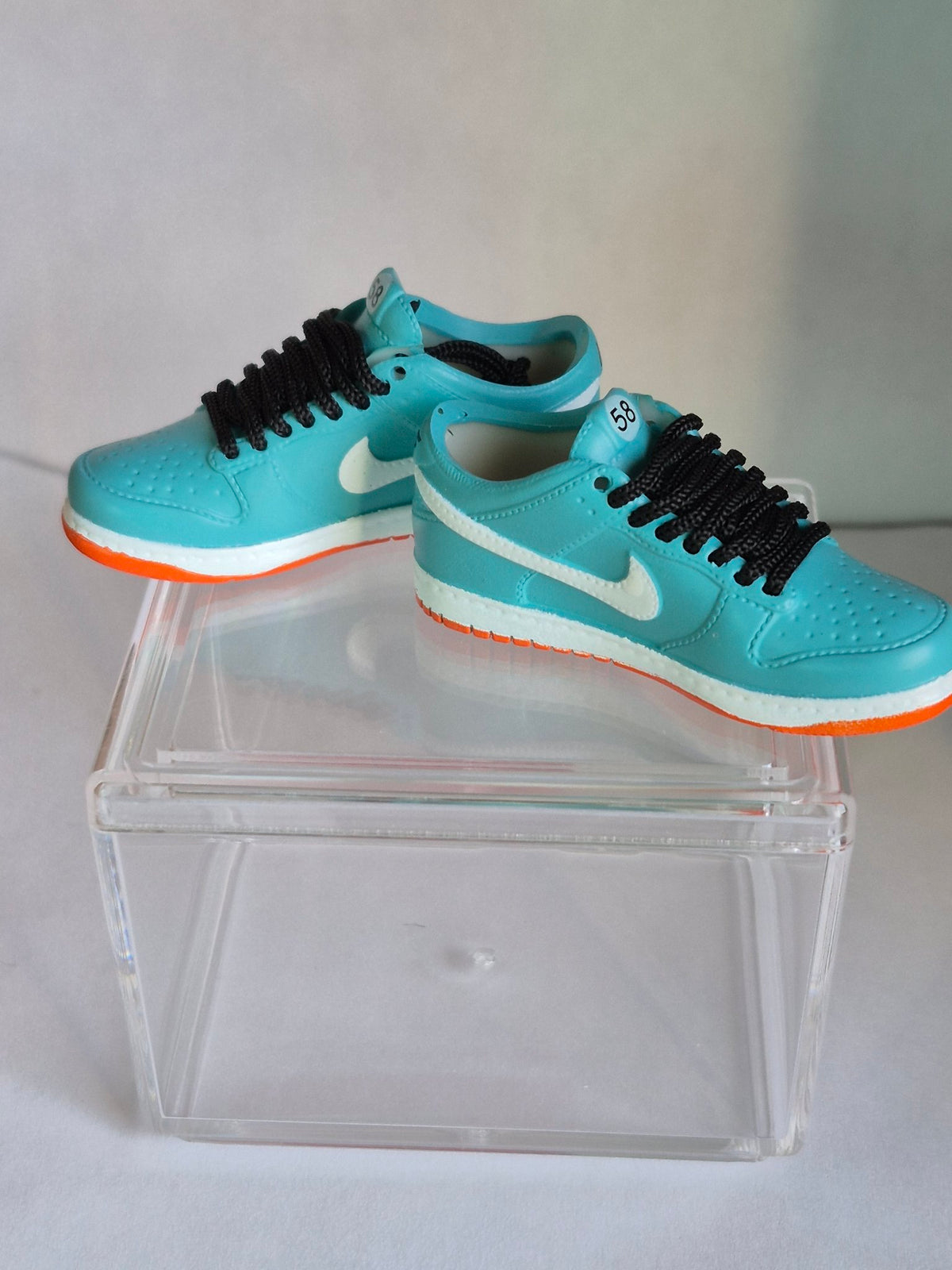 Teal Mini Sneakers with Black Laces – Collectible Pair with Display Case