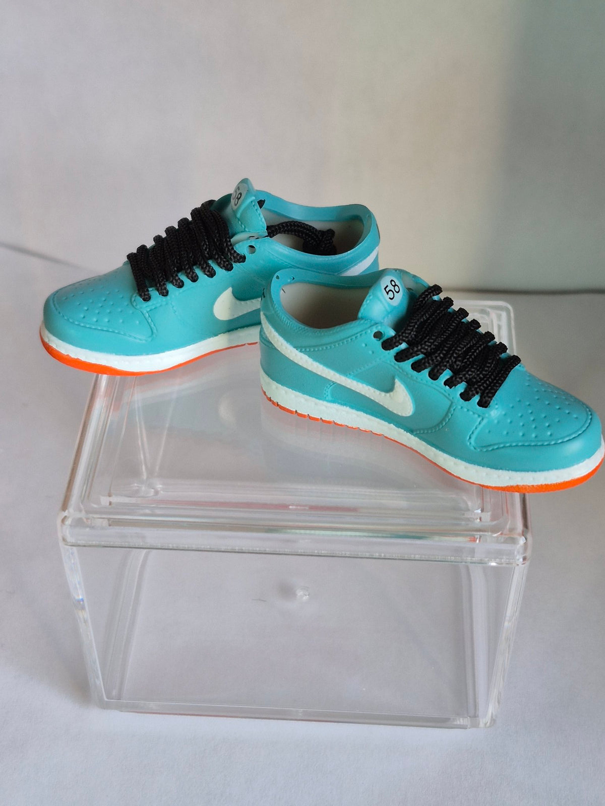 Teal Mini Sneakers with Black Laces – Collectible Pair with Display Case