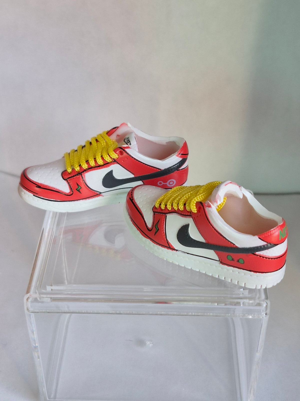 Red and White Cartoon Mini Sneakers – Collectible Pair with Display Case