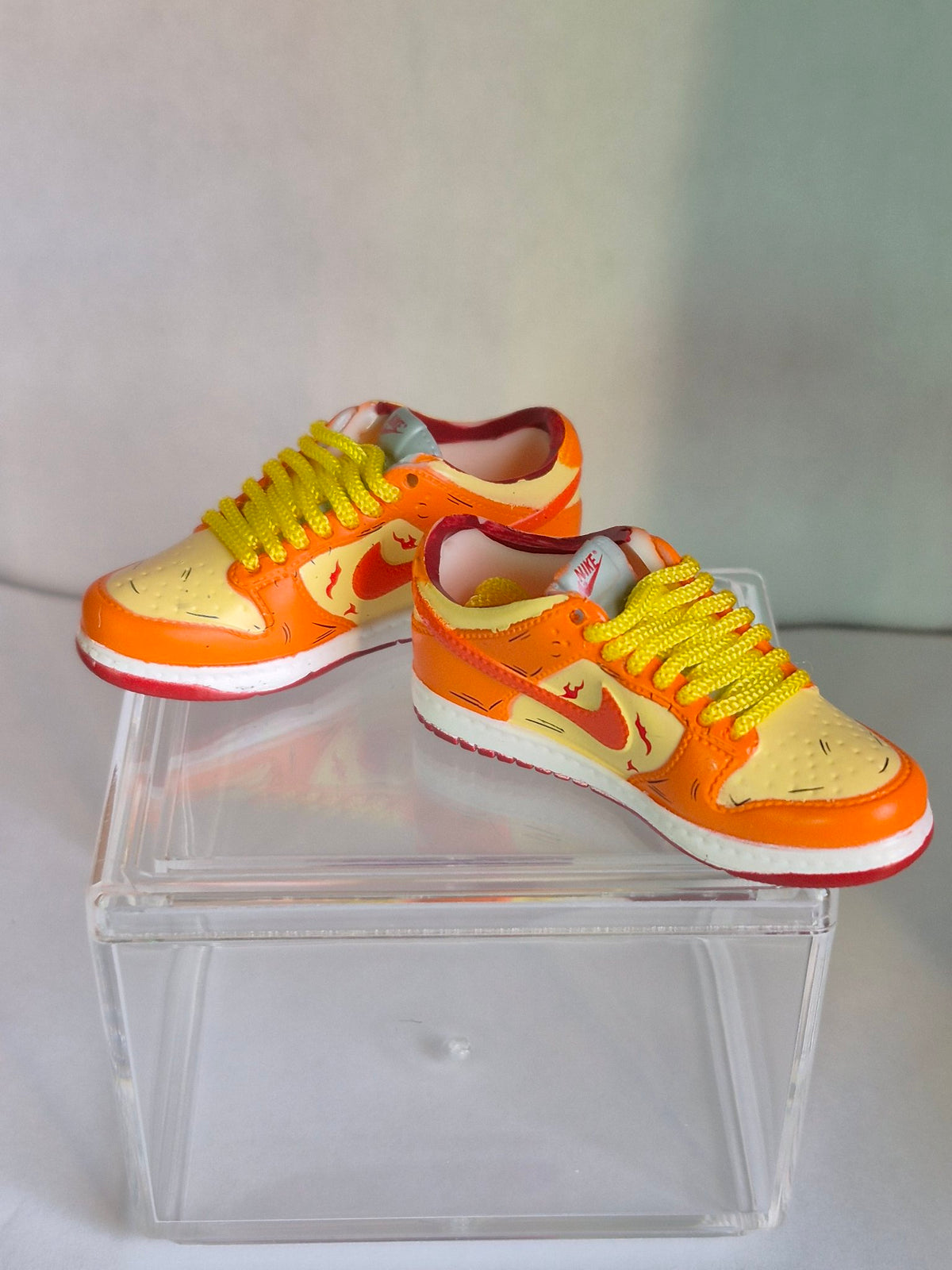Orange Flame Mini Sneakers – Collectible Pair with Display Case