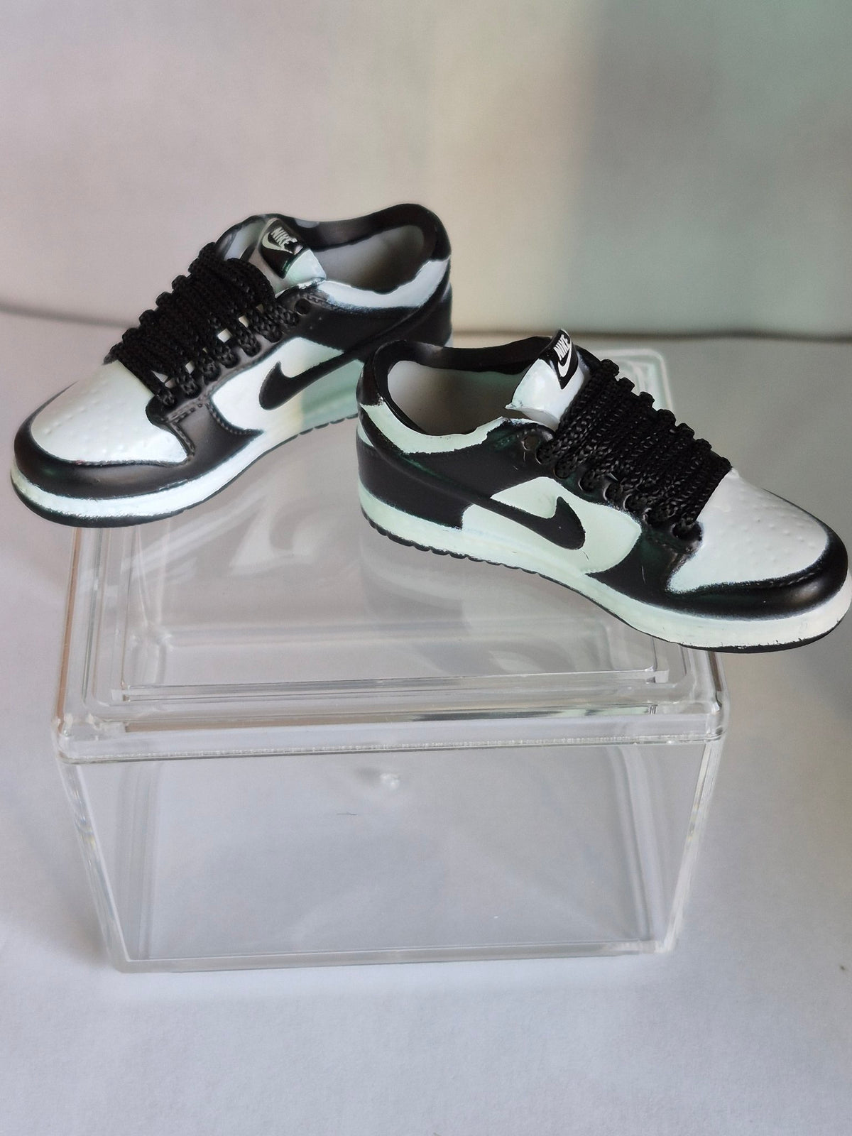 Black and White Mini Sneakers – Collectible Pair with Display Case