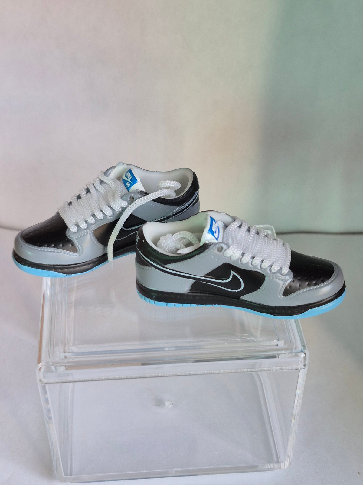 Gray and Black Mini Sneakers – Collectible Pair with Display Case