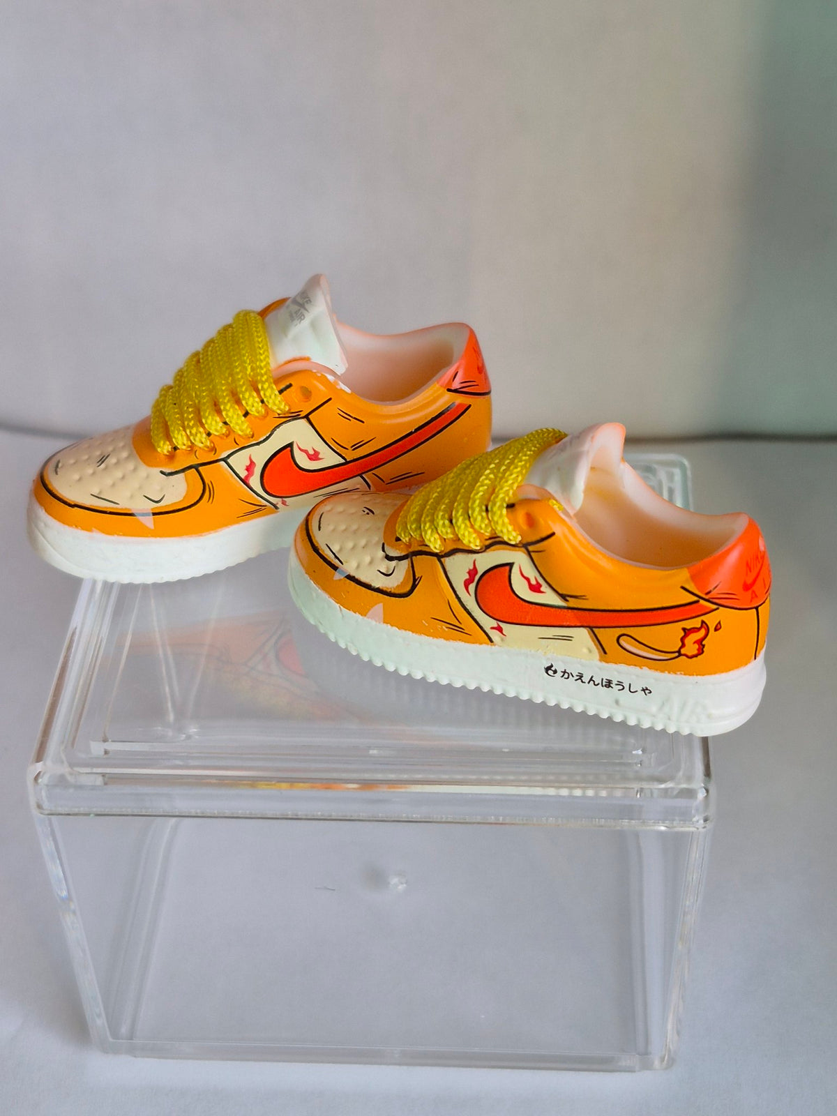 Orange Cartoon Flame Mini Sneakers – Collectible Pair with Display Case
