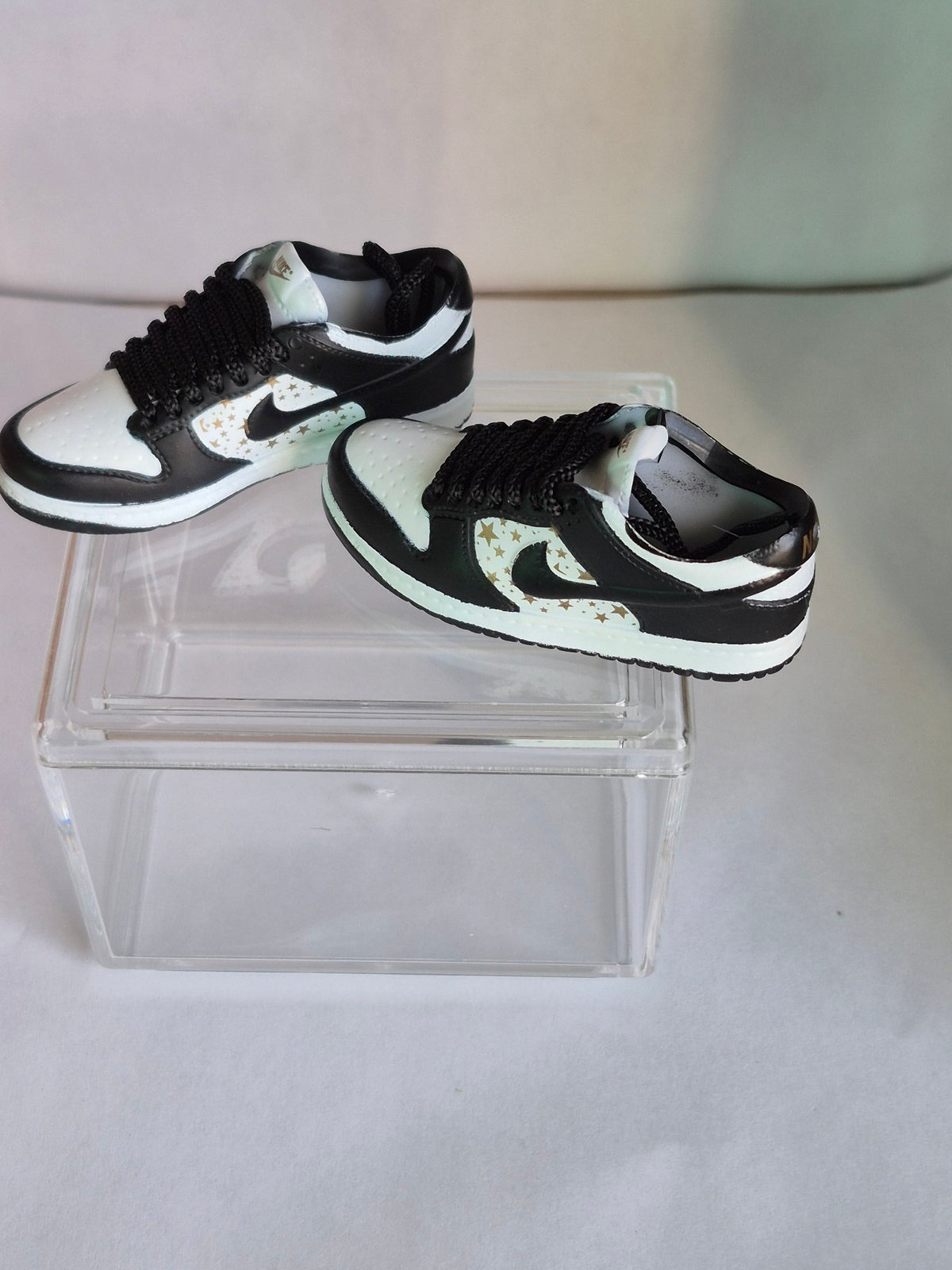 Black and White Gold Star Mini Sneakers – Collectible Pair with Display Case