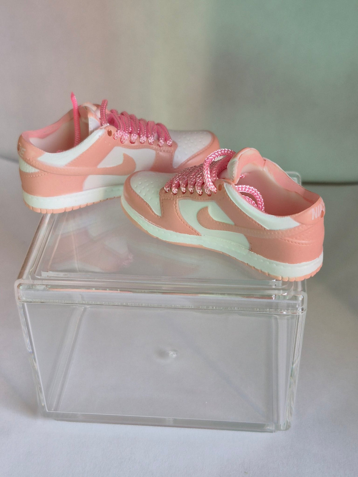 Green Mini Sneakers with Blue Lightning Swoosh – Collectible Pair with Display Case