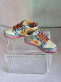 Blue Splatter Mini Sneakers with Orange Swoosh – Collectible Pair with Display Case