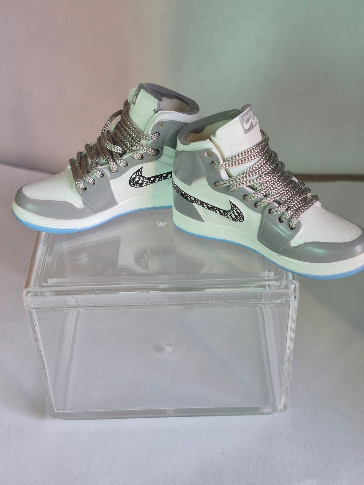 Gray and White Monogram Swoosh High-Top Mini Sneakers – Collectible Pair with Display Case