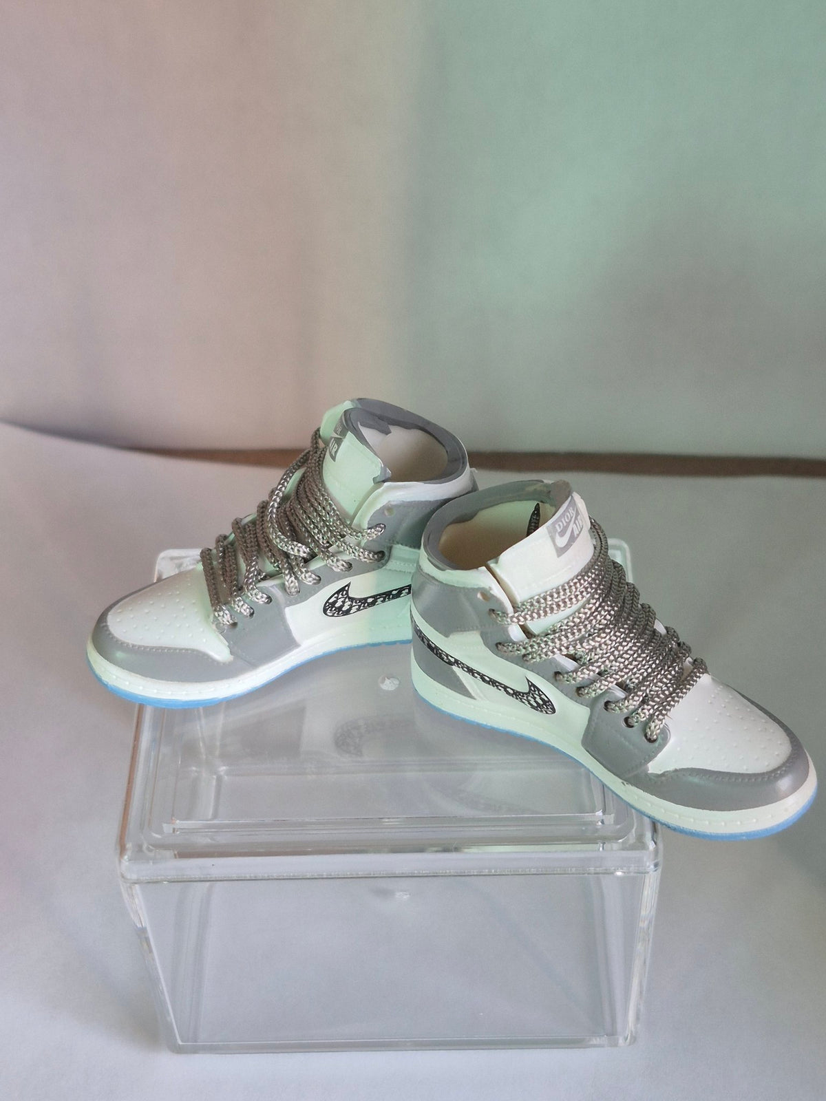 Gray and White Monogram Swoosh High-Top Mini Sneakers – Collectible Pair with Display Case