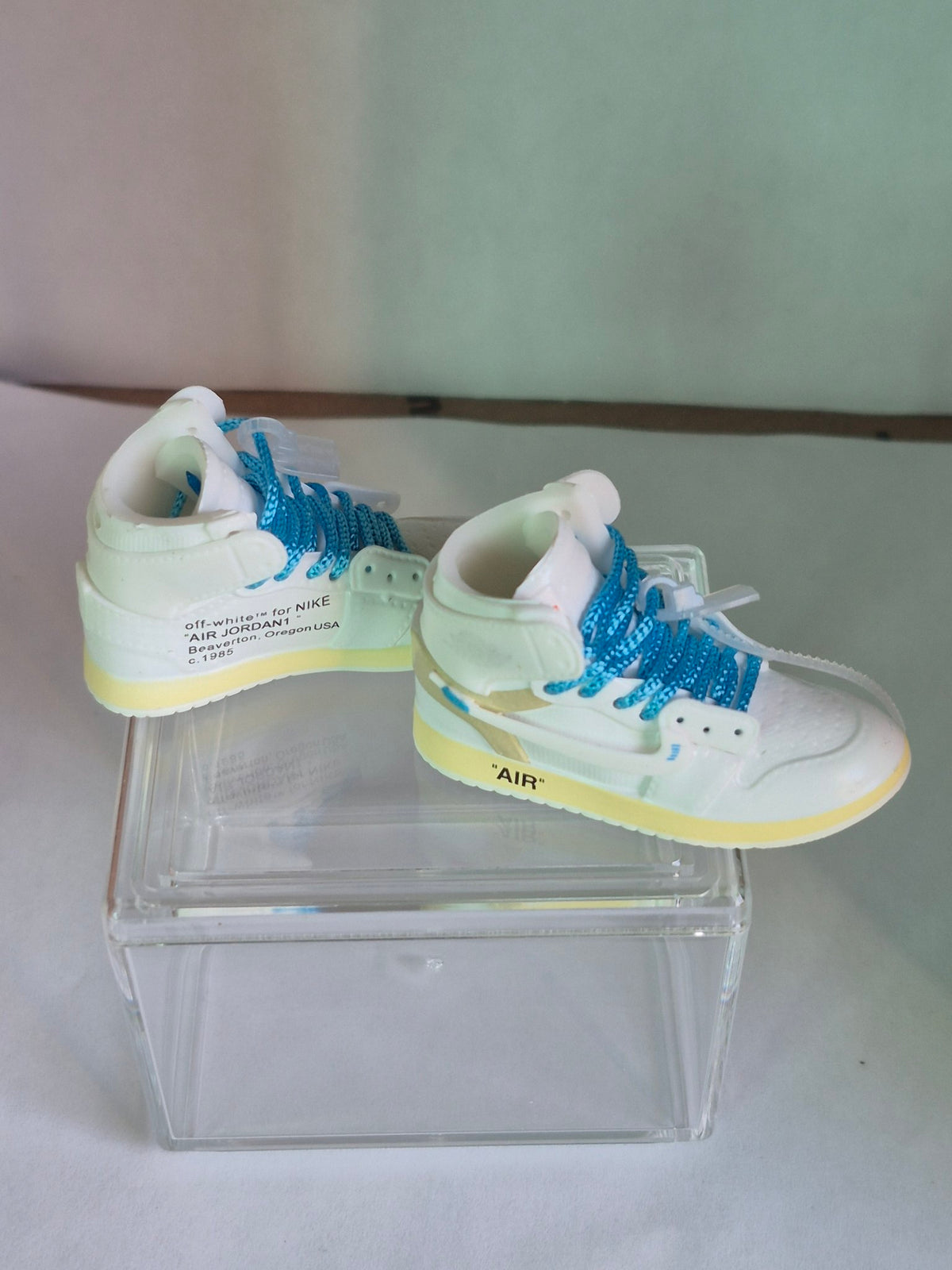 White Designer-Style High-Top Mini Sneakers with Blue Laces – Collectible Pair with Display Case