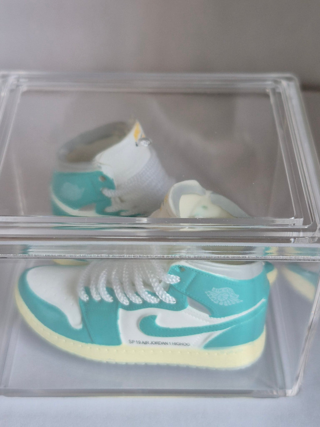 Teal and White High-Top Mini Sneakers – Collectible Pair with Display Case