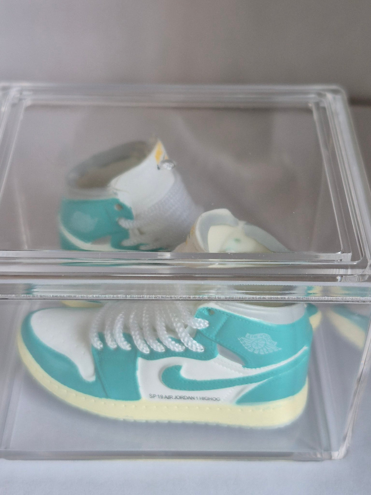 Teal and White High-Top Mini Sneakers – Collectible Pair with Display Case