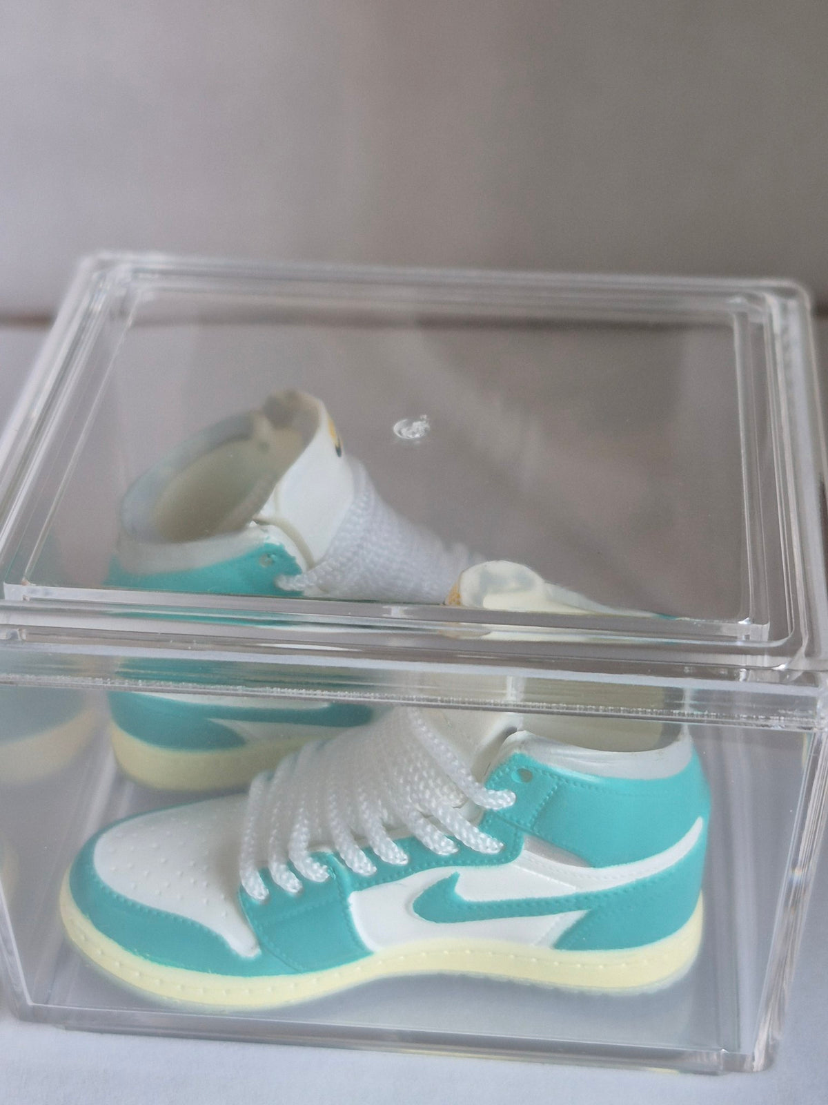 Teal and White High-Top Mini Sneakers – Collectible Pair with Display Case