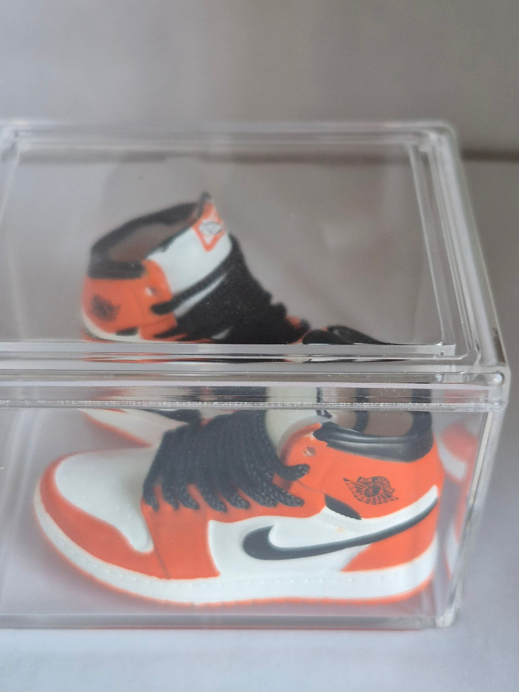 Orange and White High-Top Mini Sneakers with Black Swoosh – Collectible Pair with Display Case