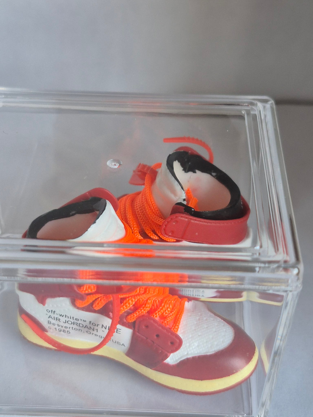Red and White Designer-Style High-Top Mini Sneakers with Orange Laces – Collectible Pair with Display Case