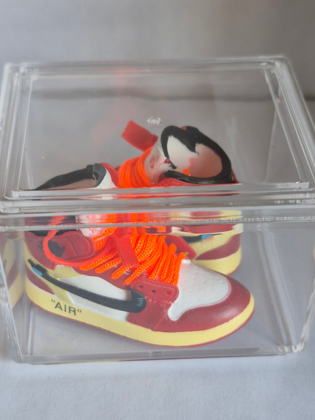 Red and White Designer-Style High-Top Mini Sneakers with Orange Laces – Collectible Pair with Display Case