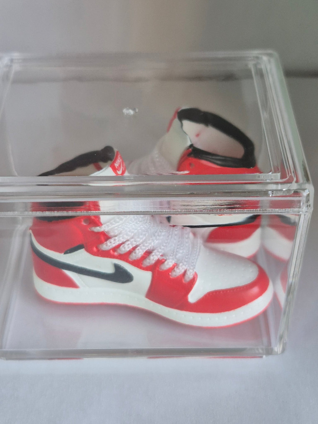 Red and White High-Top Mini Sneakers – Collectible Pair with Display Case