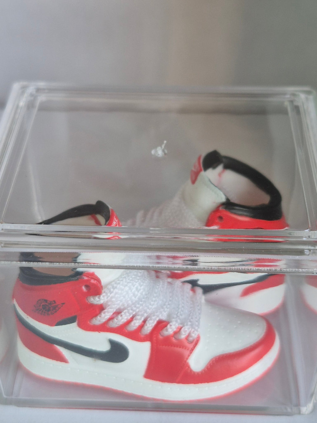 Red and White High-Top Mini Sneakers – Collectible Pair with Display Case