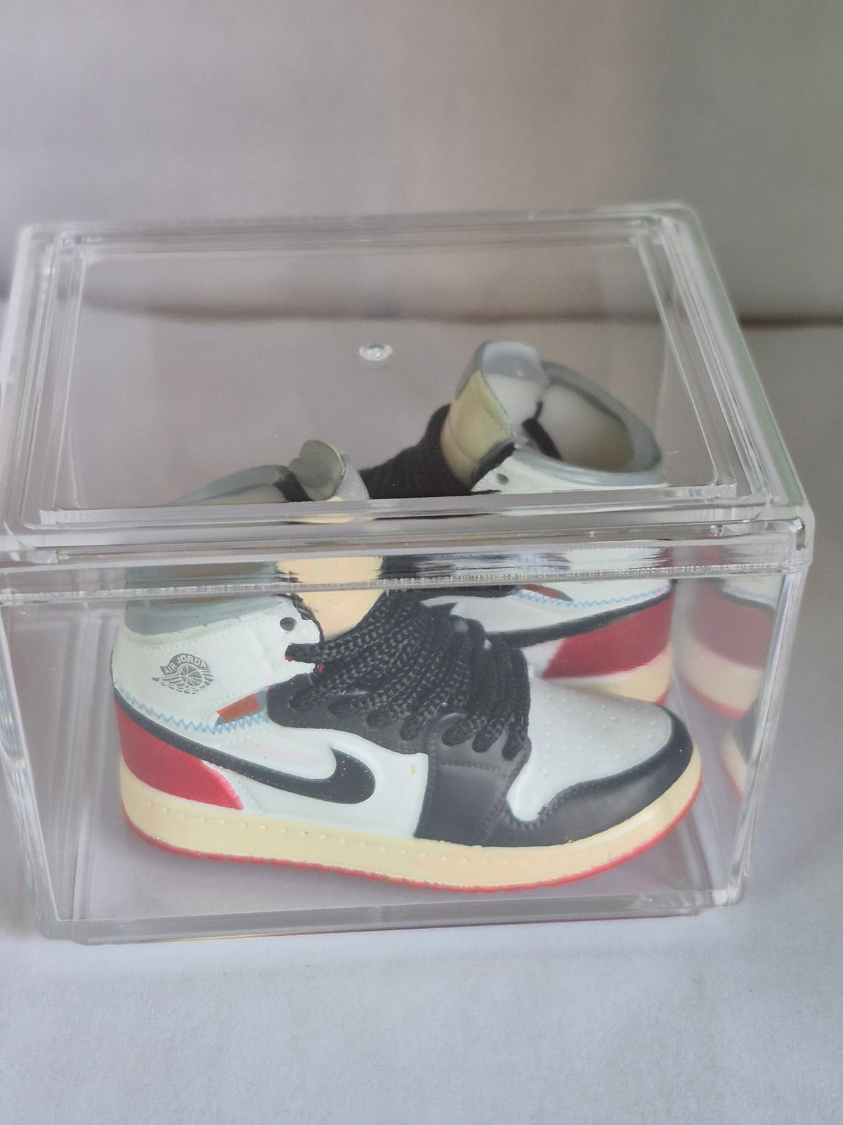 White Black and Red High-Top Mini Sneakers – Collectible Pair with Display Case