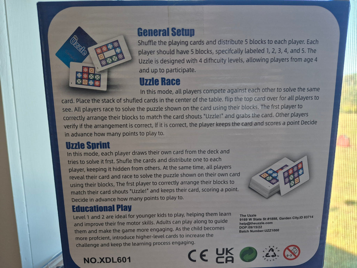 The Uzzle board game box back