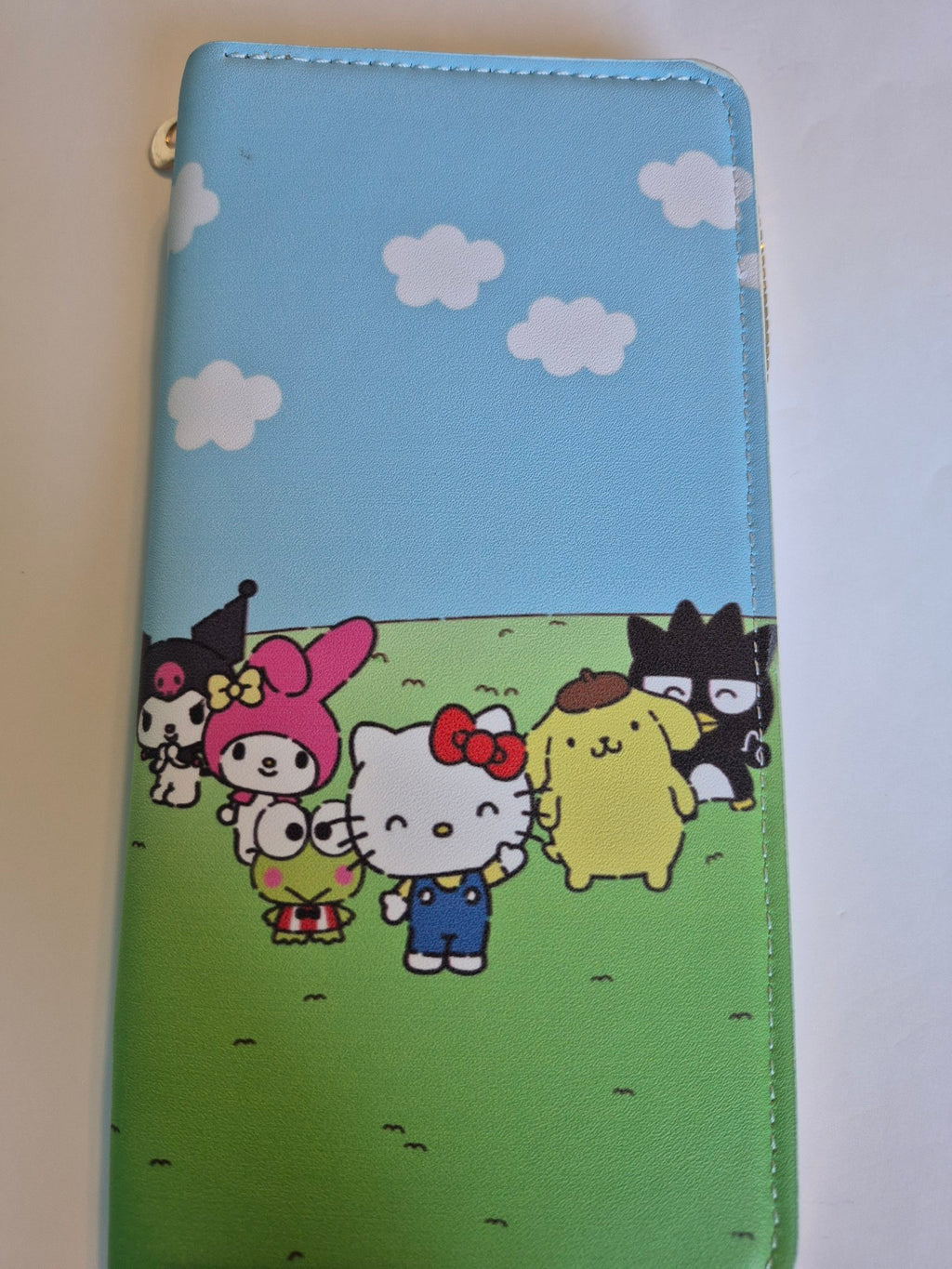 Sanrio Zip-Around Wallet – Friends in the Field, Hello Kitty & Crew