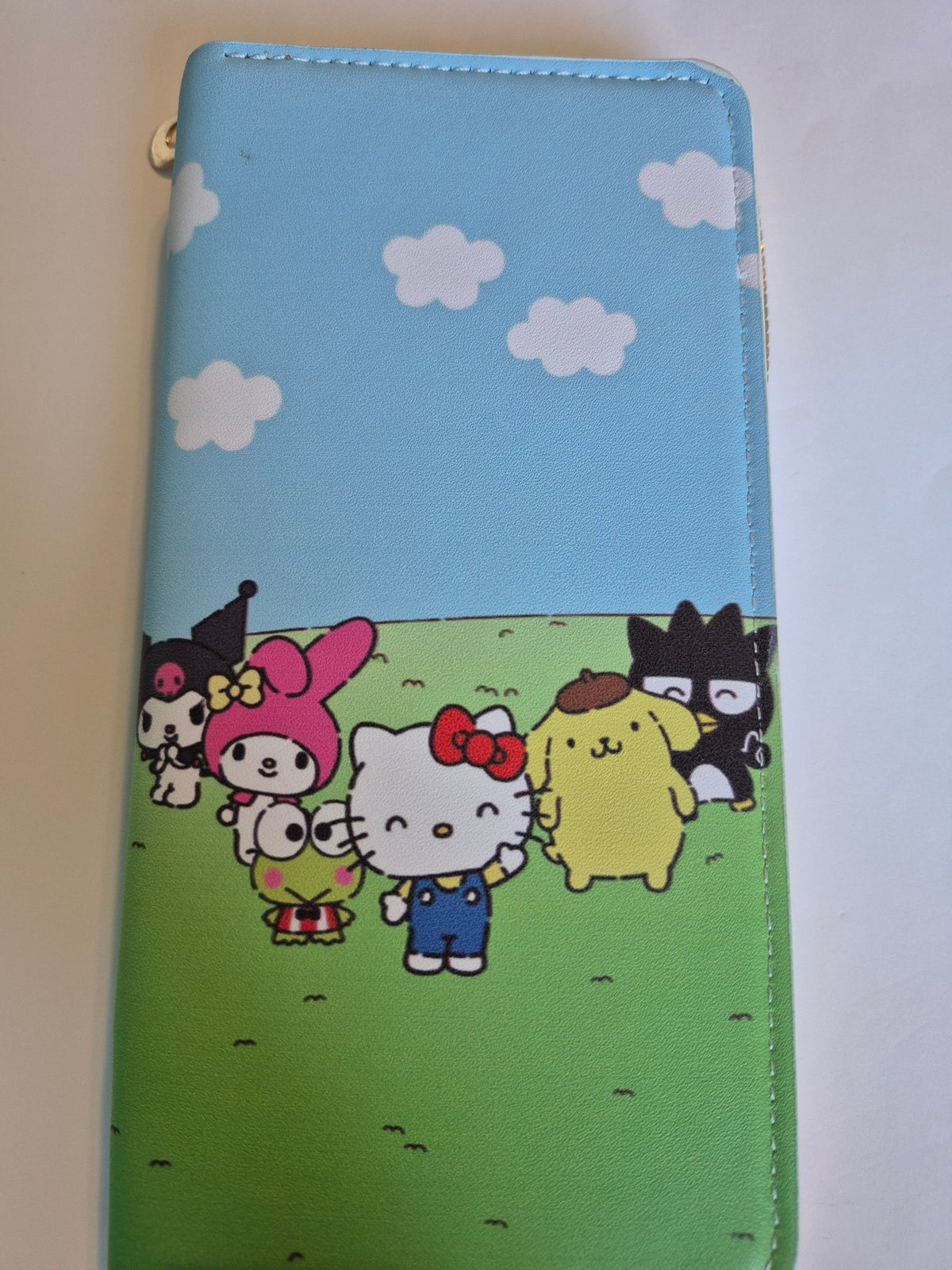 Sanrio Zip-Around Wallet – Friends in the Field, Hello Kitty & Crew