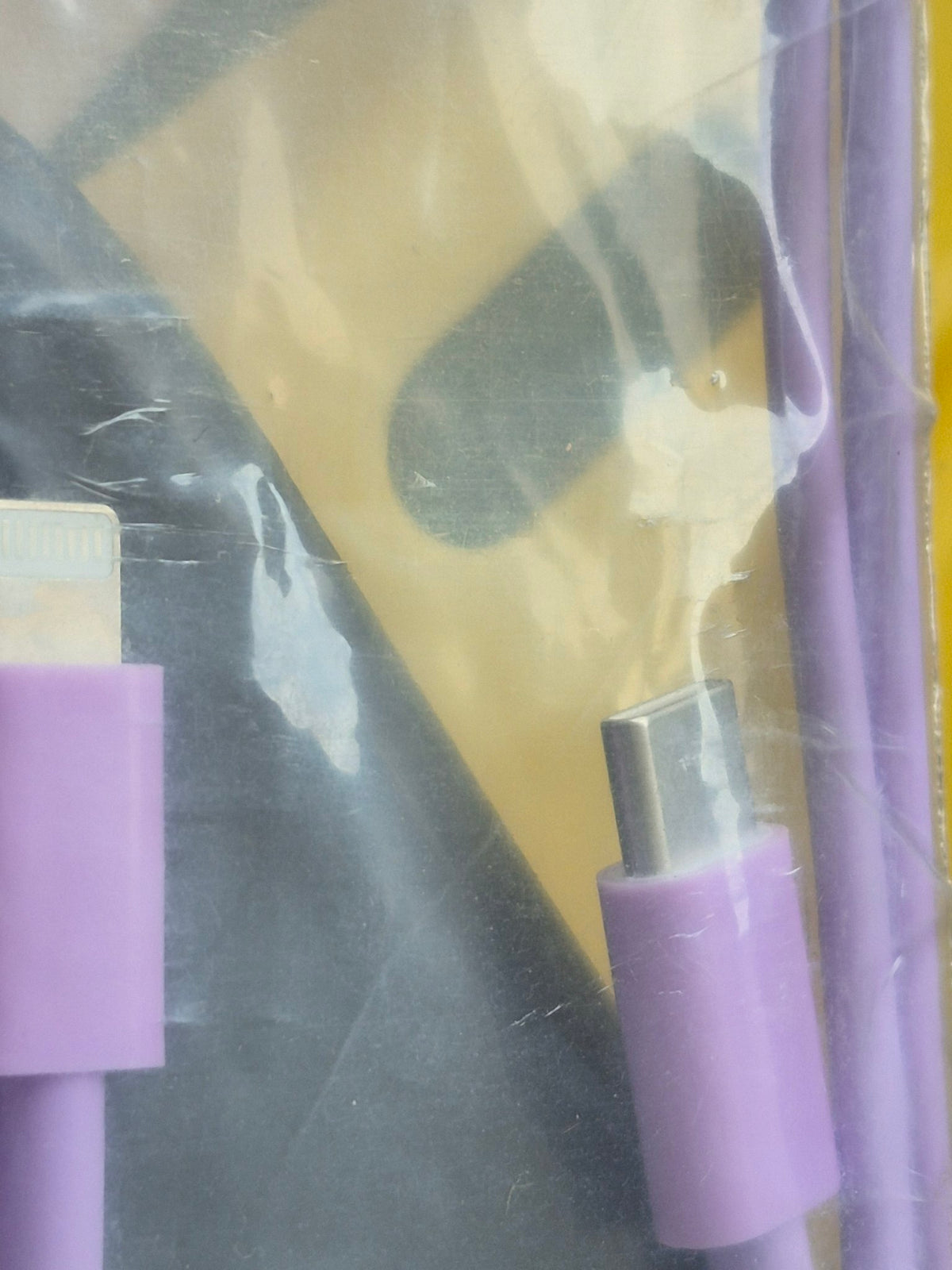 Purple USB-C to Lightning cable close-up