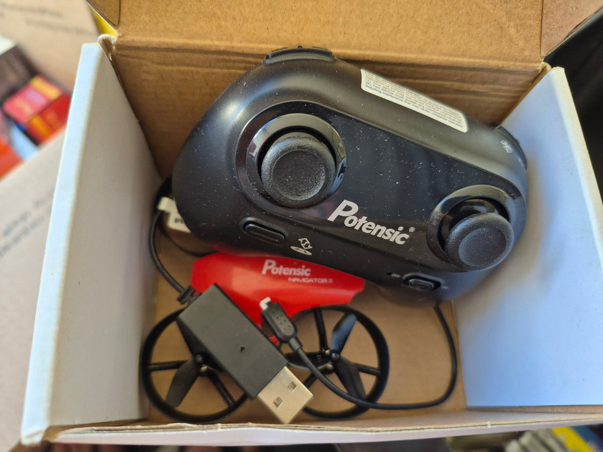 Potensic Firefly A20 mini drone box contents with controller