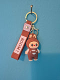 Labubu Brown Hood Overalls Keychain – Bunny Monster Character Keychain with Wrist Strap