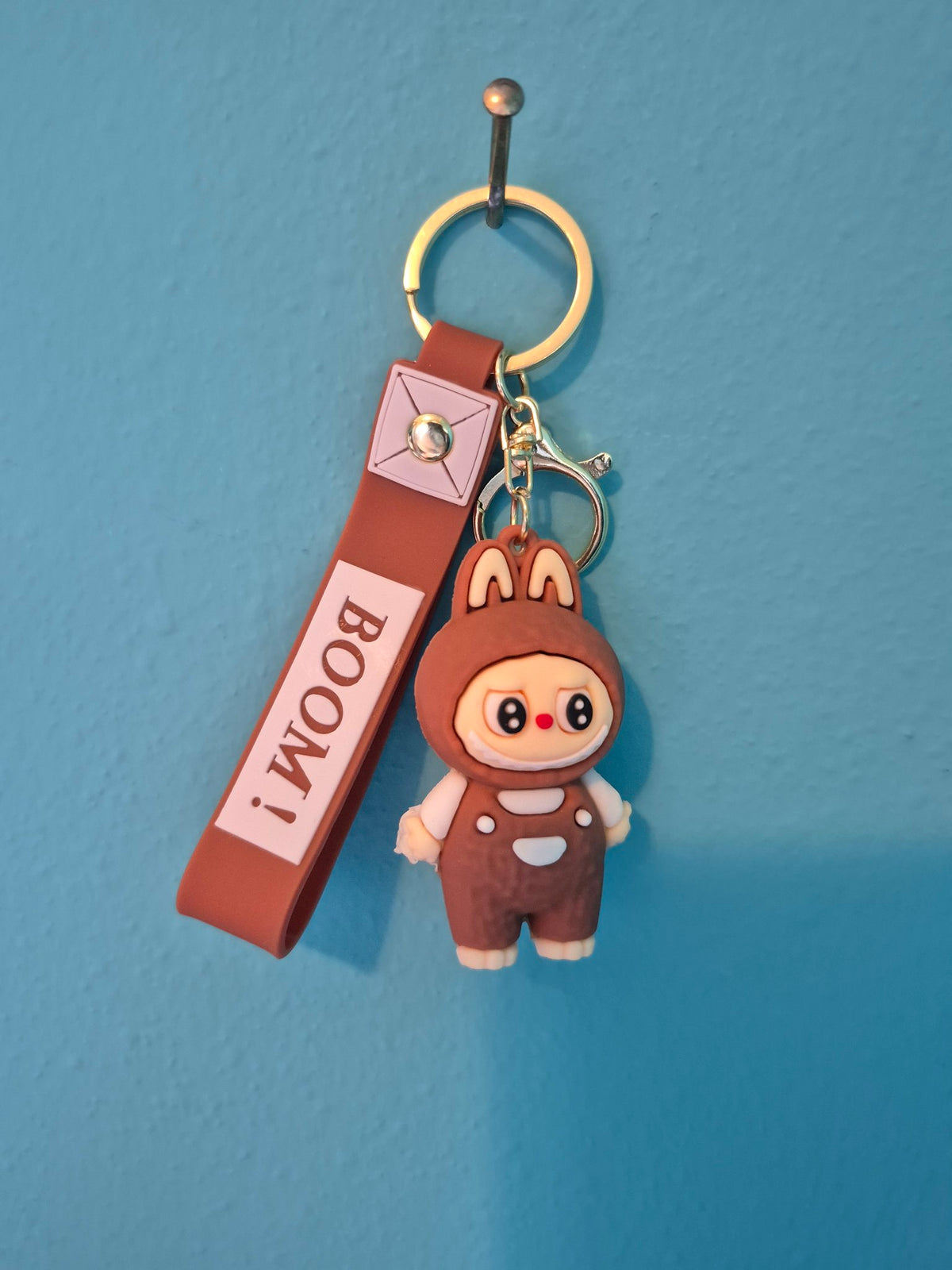 Labubu Brown Hood Overalls Keychain – Bunny Monster Character Keychain with Wrist Strap