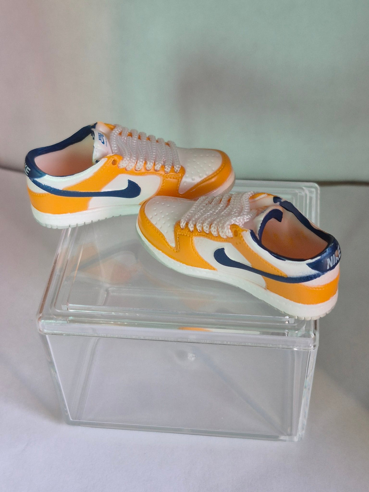 Yellow and White Mini Sneakers with Navy Swoosh – Collectible Pair with Display Case
