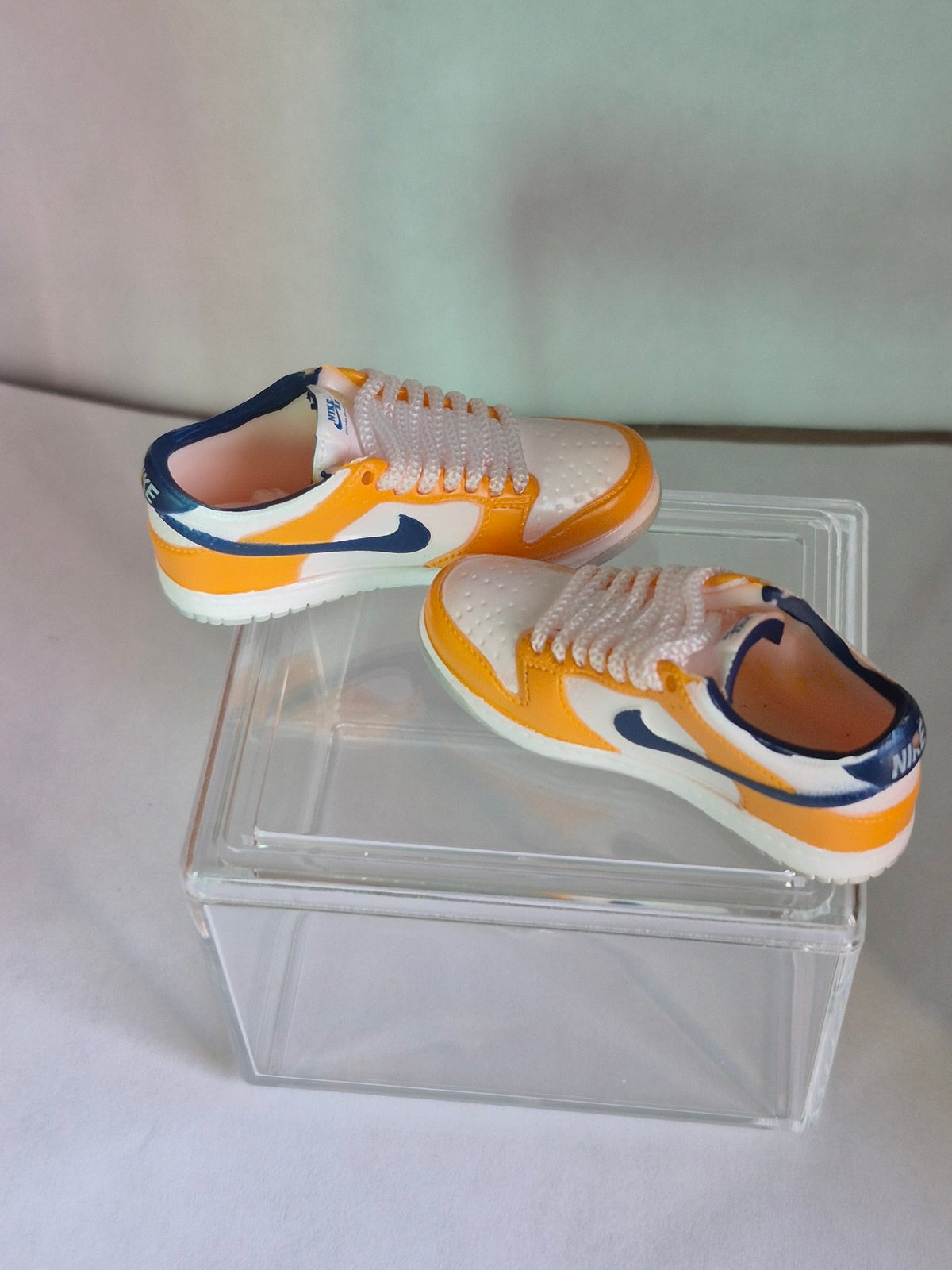 Yellow and White Mini Sneakers with Navy Swoosh – Collectible Pair with Display Case