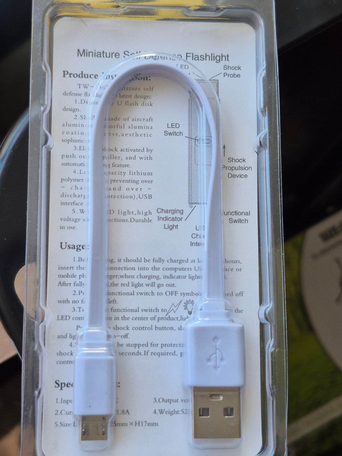TW-1502 self defense flashlight back of package